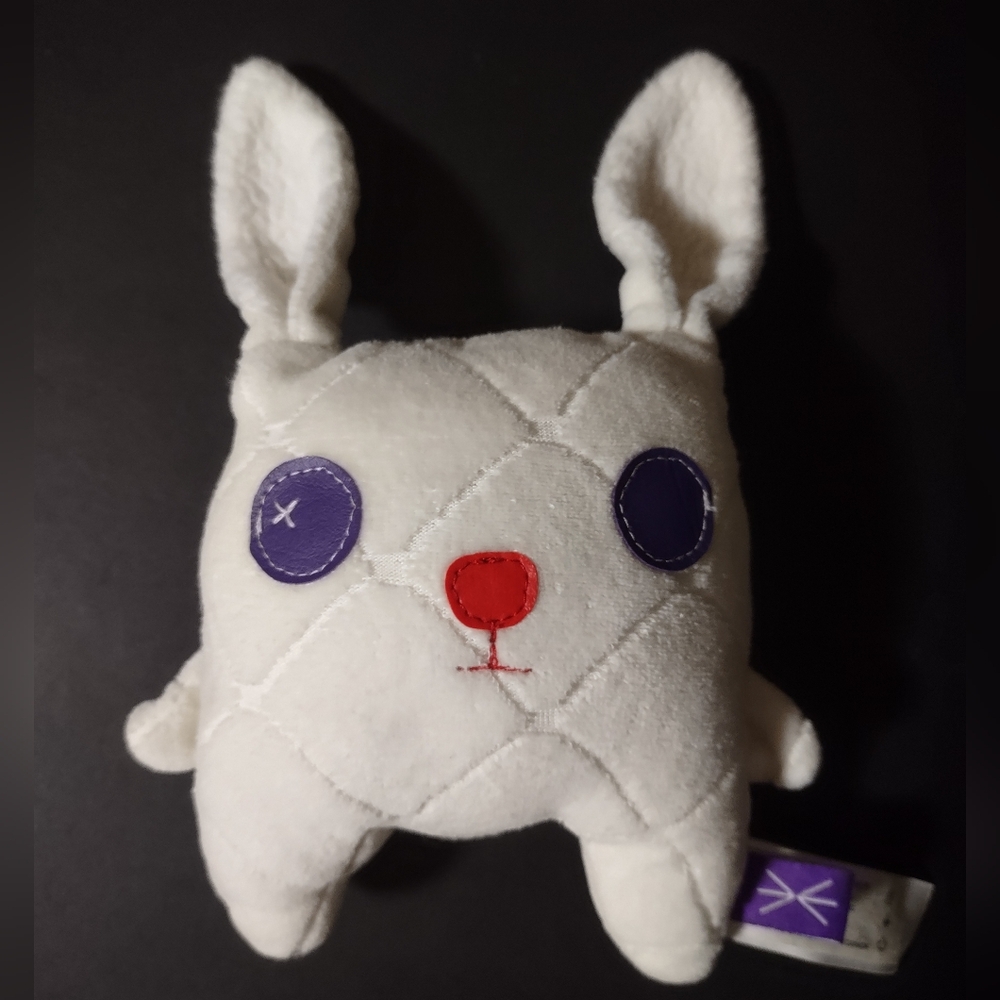 White Velvet Moustache Plush Toy with Red and Purple Accents